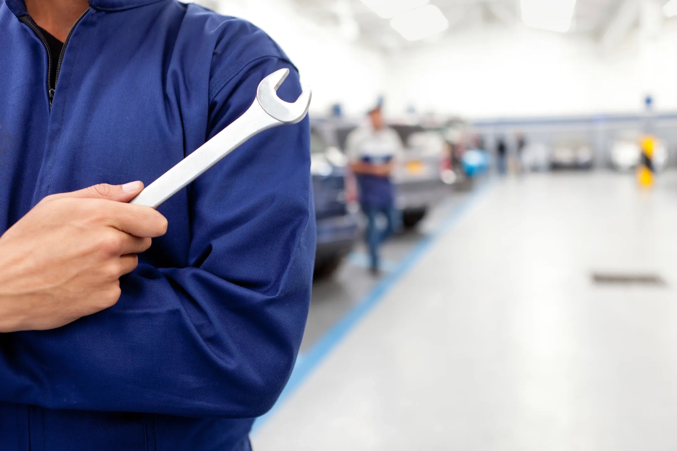 Man holding wrench