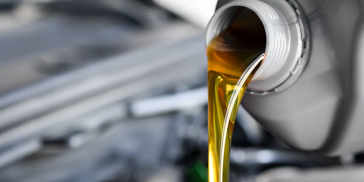 Motor oil pouring from bottle